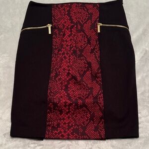 Micheal Kors Black Skirt with Red Snake-Print Panel and gold zipper side detail
